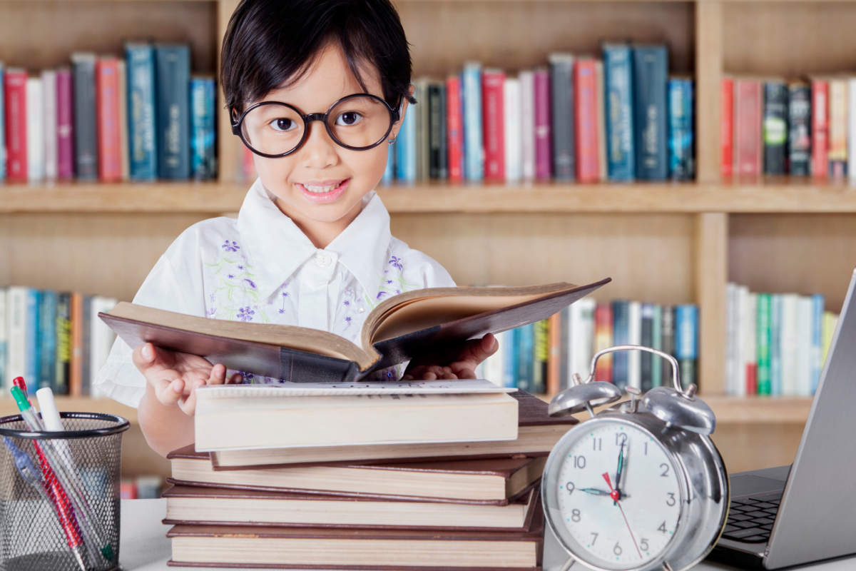 kindergarten child reading books