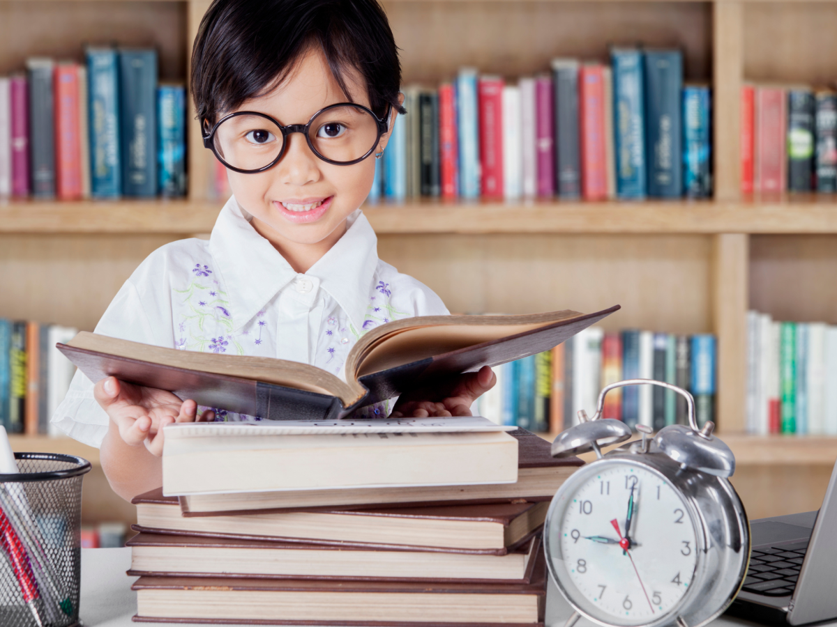 kindergarten child reading books