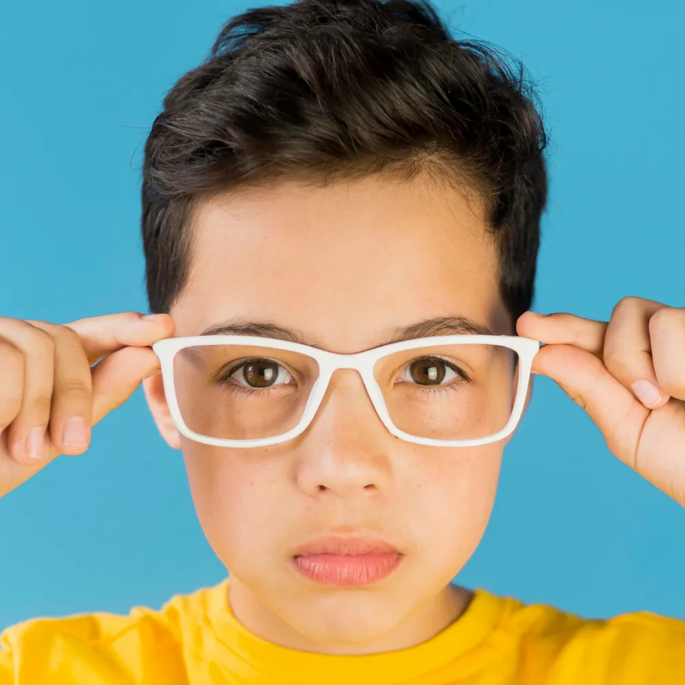 child with glasses